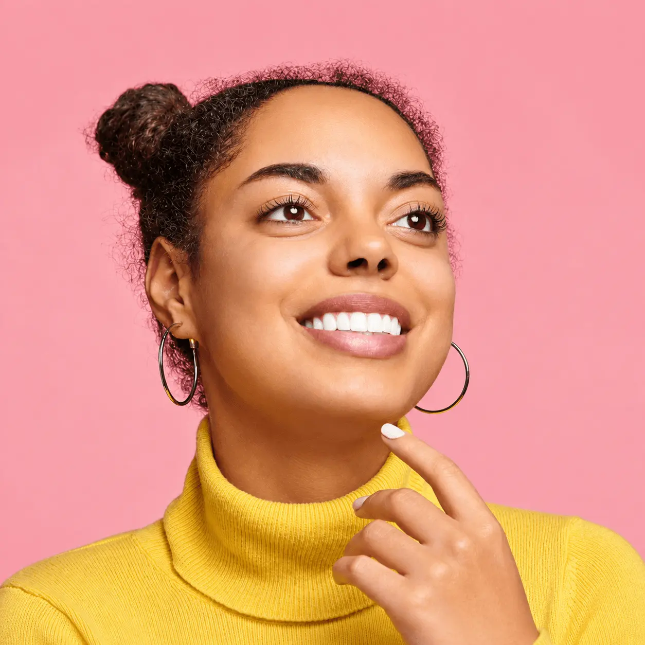 Patient smiling, financing her InstaVeneers treatment with Sunbit